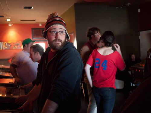 Aaron "Dropshot" Nelson glances back mid-game to make sure people are filling out the score thingies correctly. This guy is ACE at running tourneys, man.